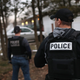 Customs and Border Protection agents watch as Homeland Security Investigations agents detain an alleged MS-13 member in Brentwood, New York in March 2018 as part of “Operation Matador.”